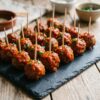 Mini albóndigas sauce tomate piquante sur piques, buffet traiteur